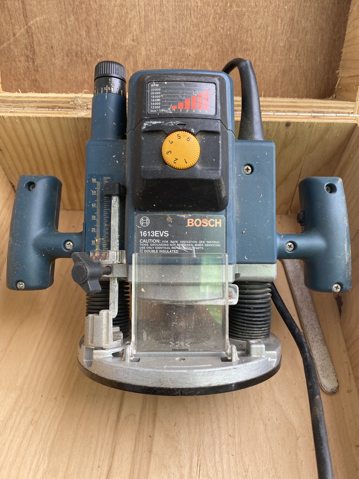 Bosch plunge router and assorted bits