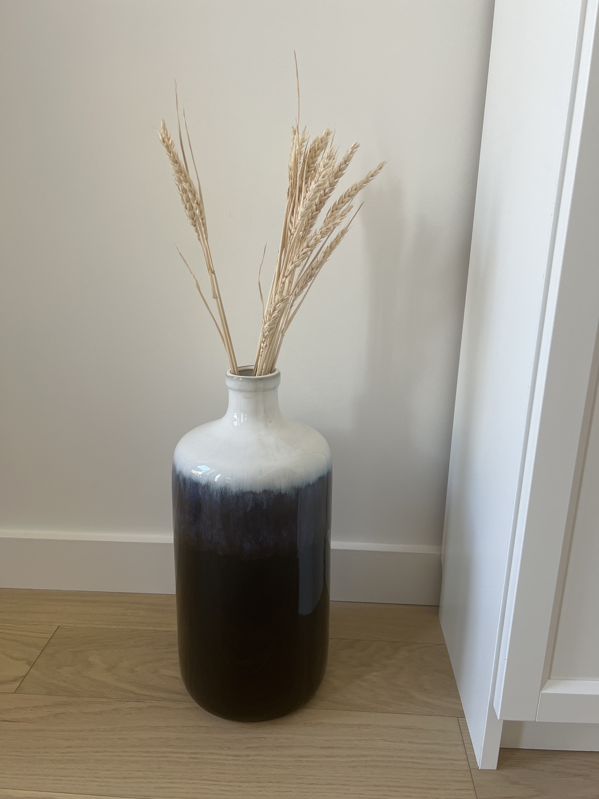 Vase including dried flowers for $10