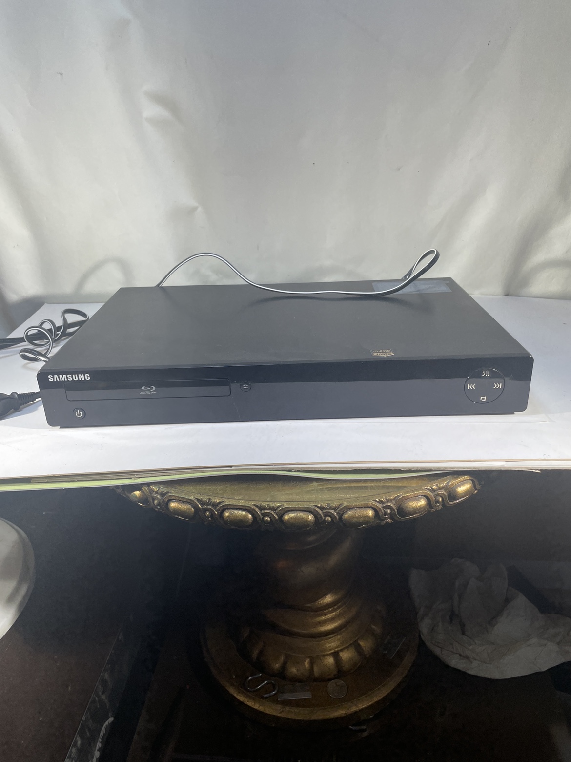 Samsung Blu-ray Disc player behind