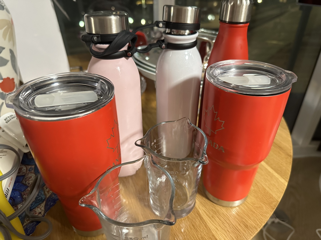 Water bottles, mugs and and measuring cups all for 10