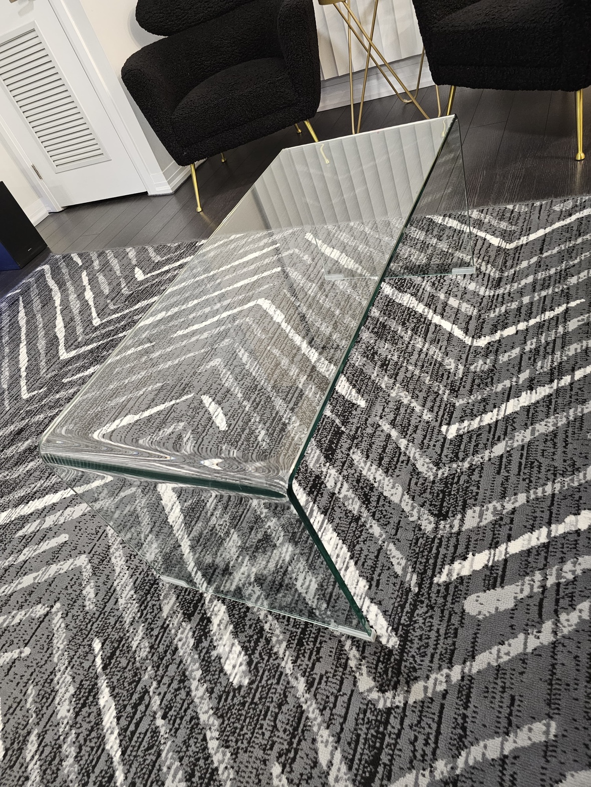 Glass waterfall coffee table