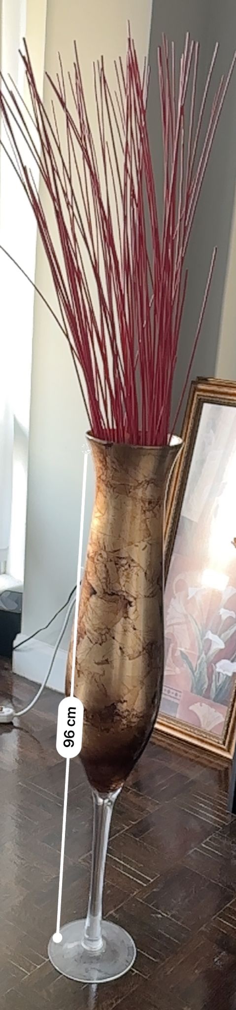 Tall golden vase