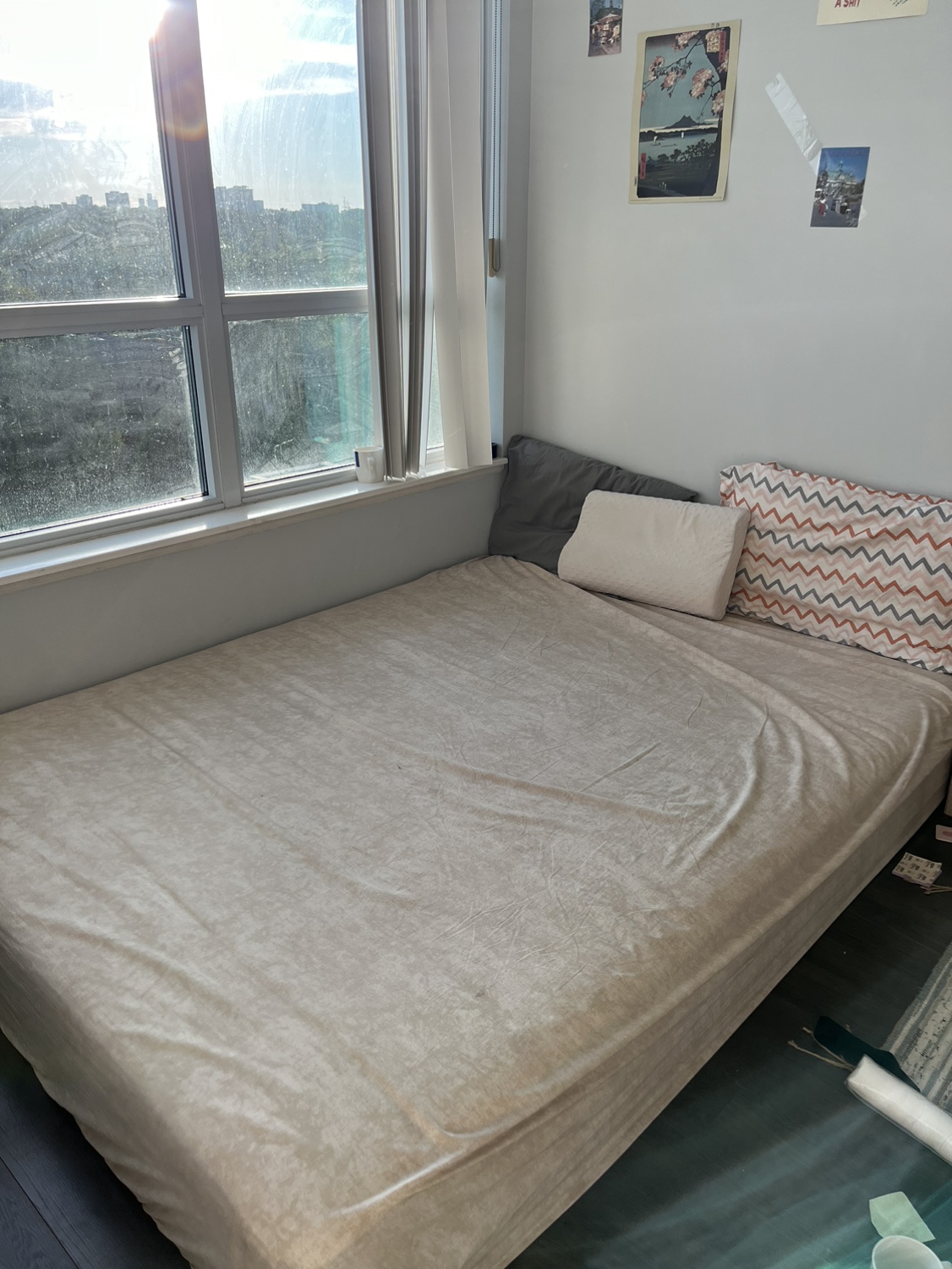 Queen mattress with sheet and pillows