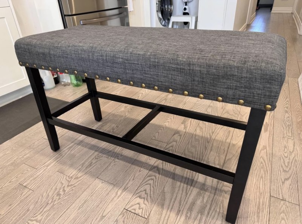 Grey counter-height upholstered bench