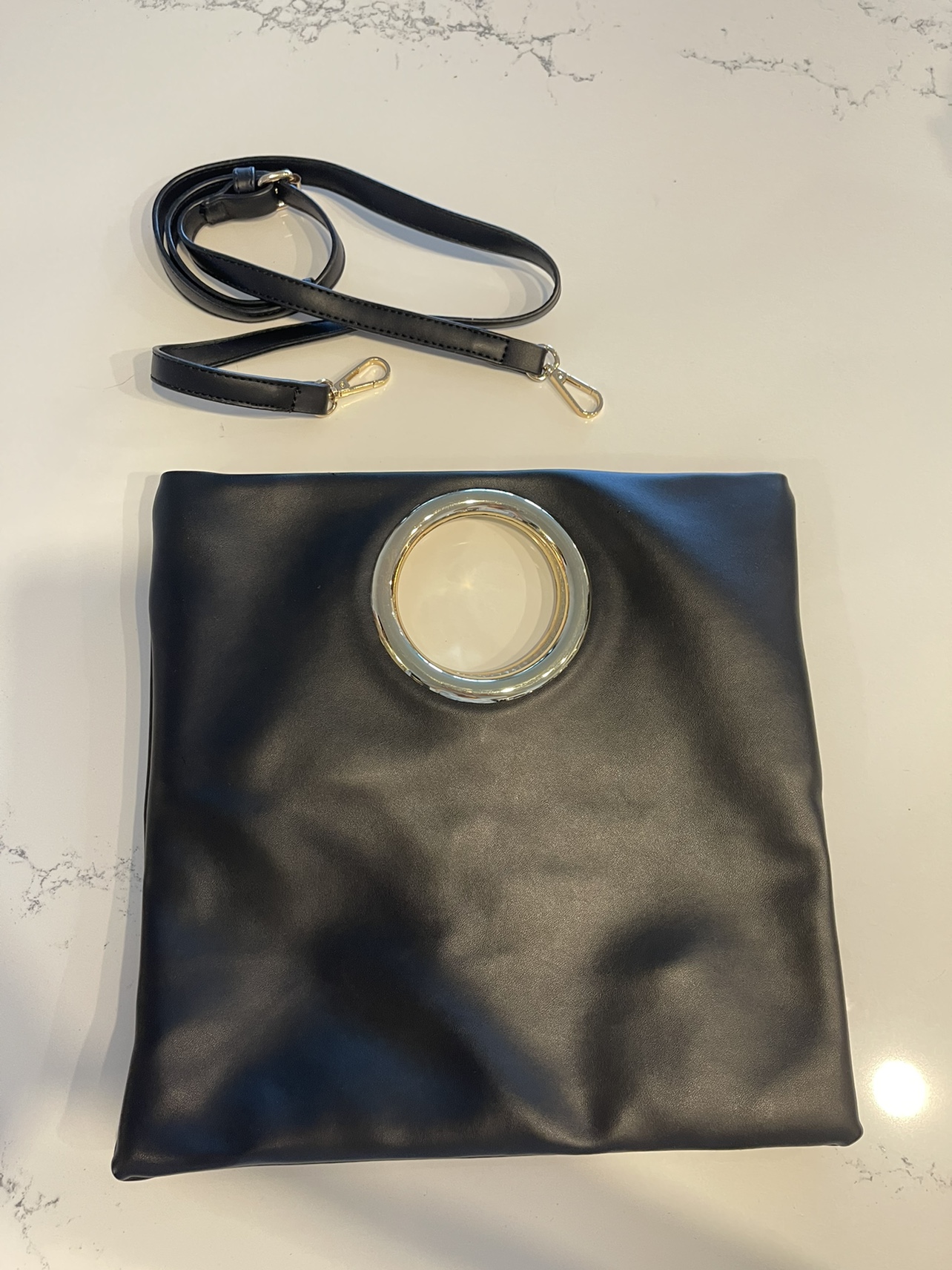 Black Leather Handbag with Gold Ring Handle image indicator(3)