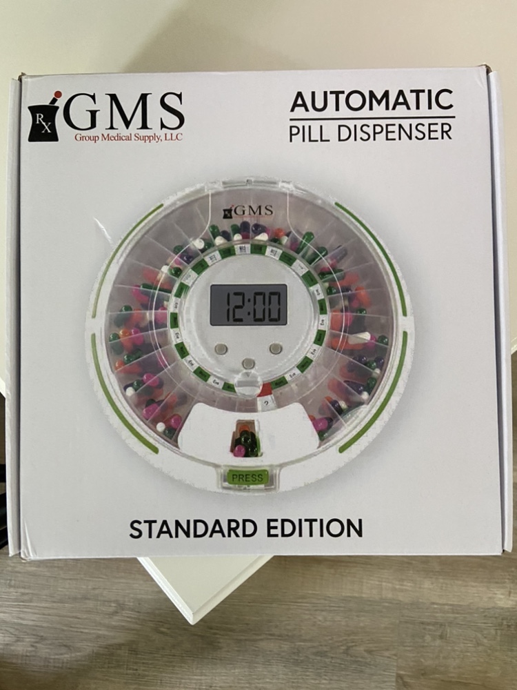 Automatic timed pill dispenser - photo 2