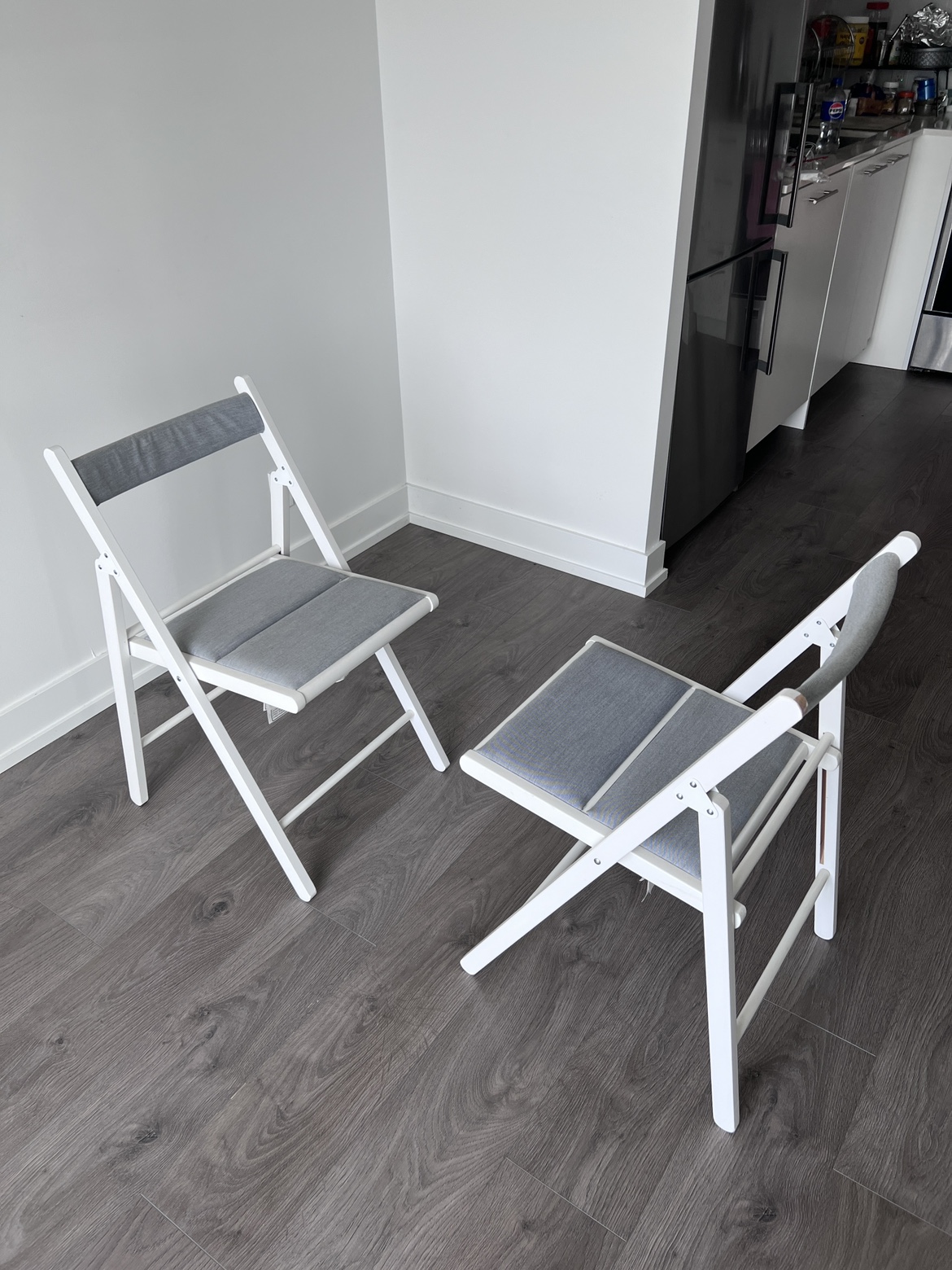 A Set of IKEA’s FROSVI White Folding Chairs with Grey Cushion - photo 3