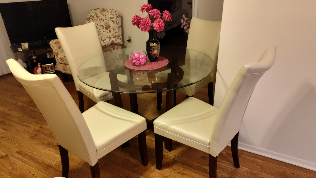Round glass dining table and 4 chairs