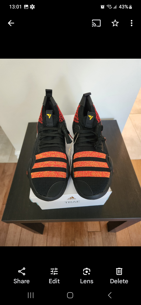 Pair of men's Adidas basketball shoes size 11.5