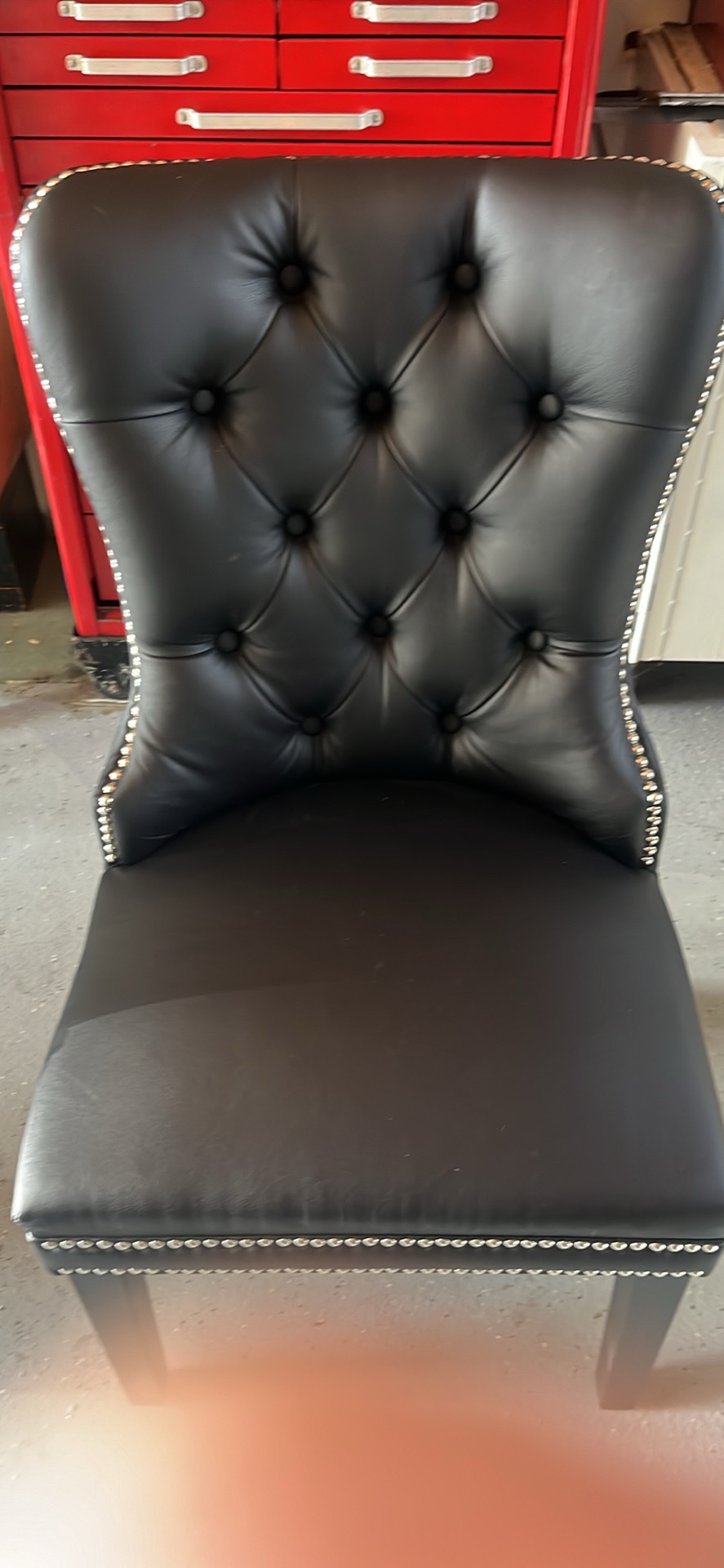 Black tufted chairs