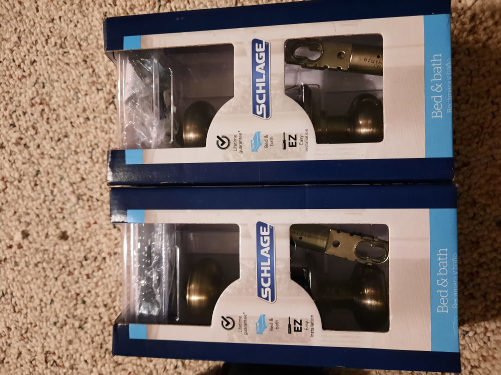 Brand new door knobs with privacy lock
