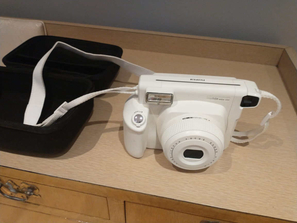 White Fujifilm Instax Polaroid Camera with Case thumbnail