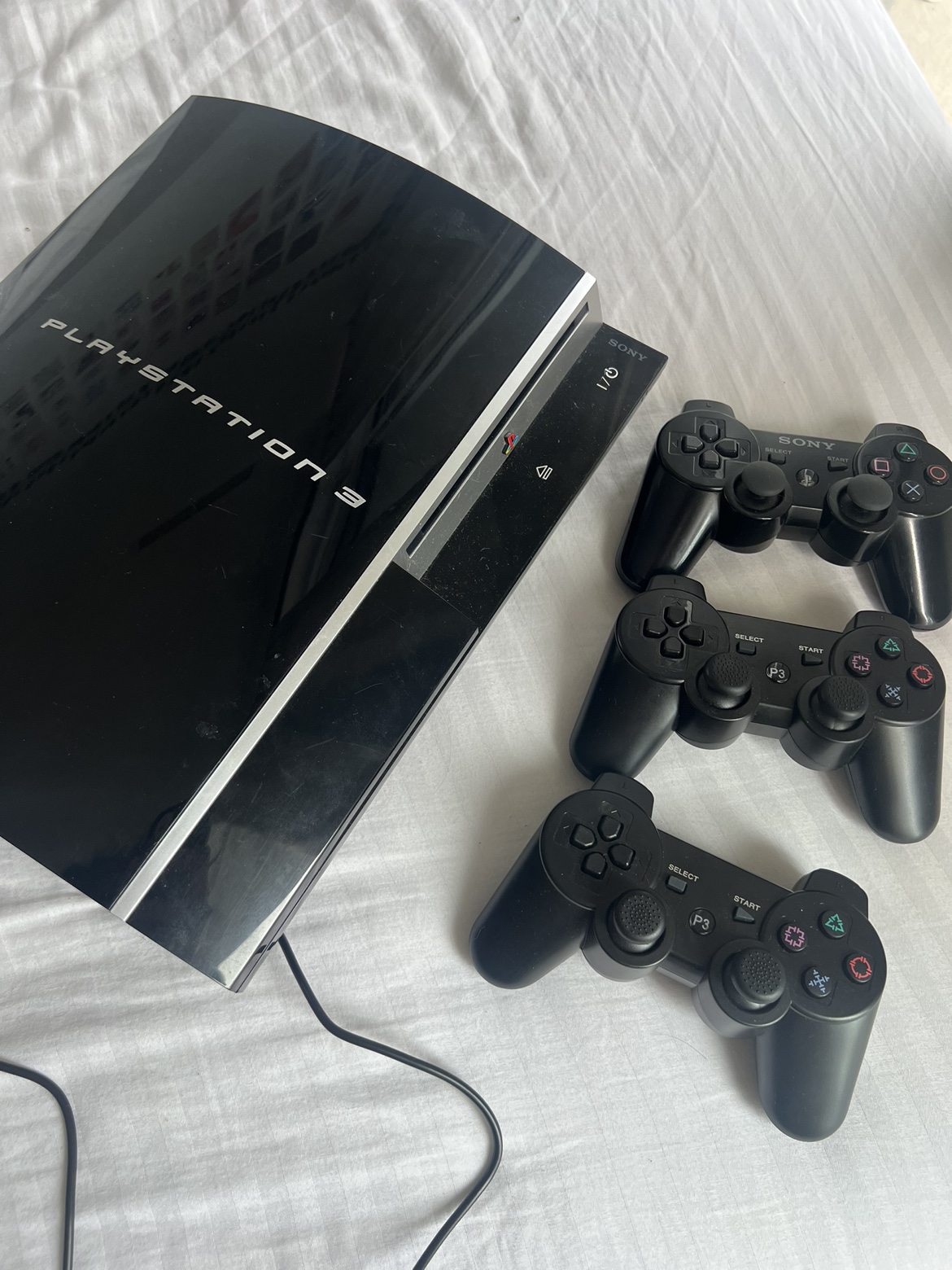 Ps3 with controller and games thumbnail