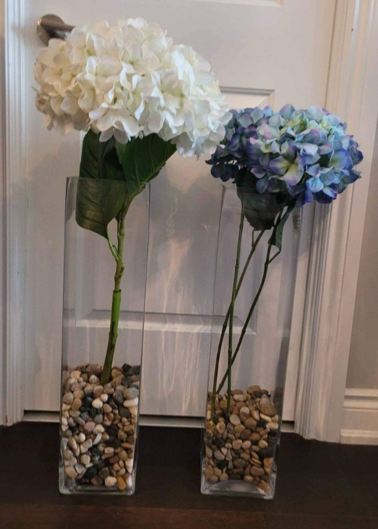 Vases with rocks, flowers not included