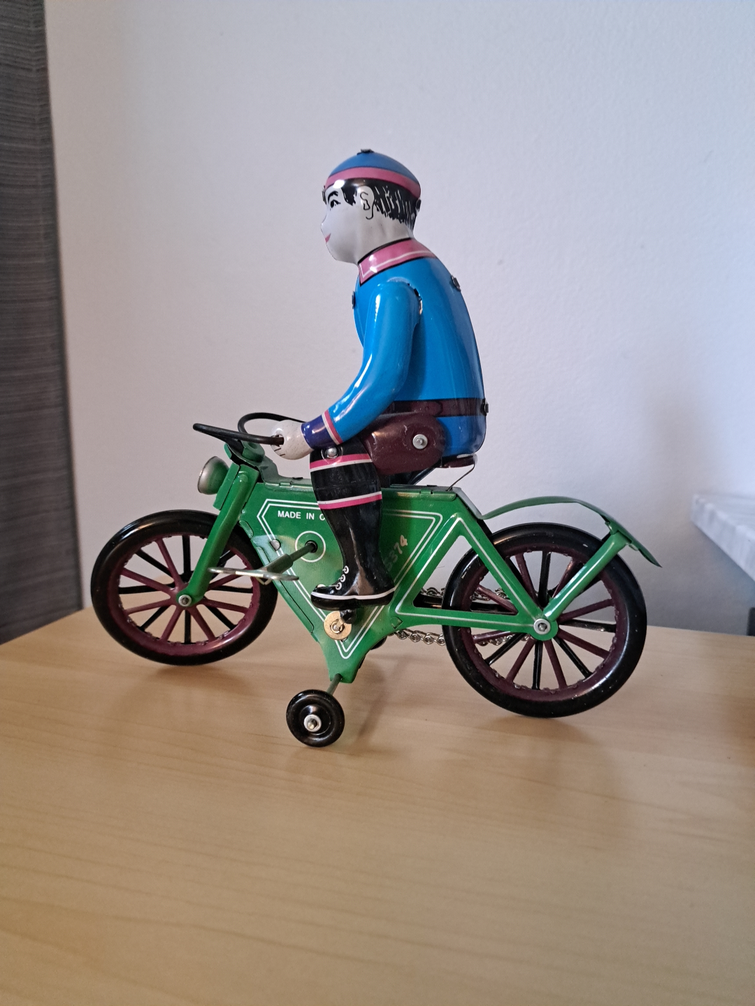 TIN TOYS MAN ON BICYCLE WORKS GREAT