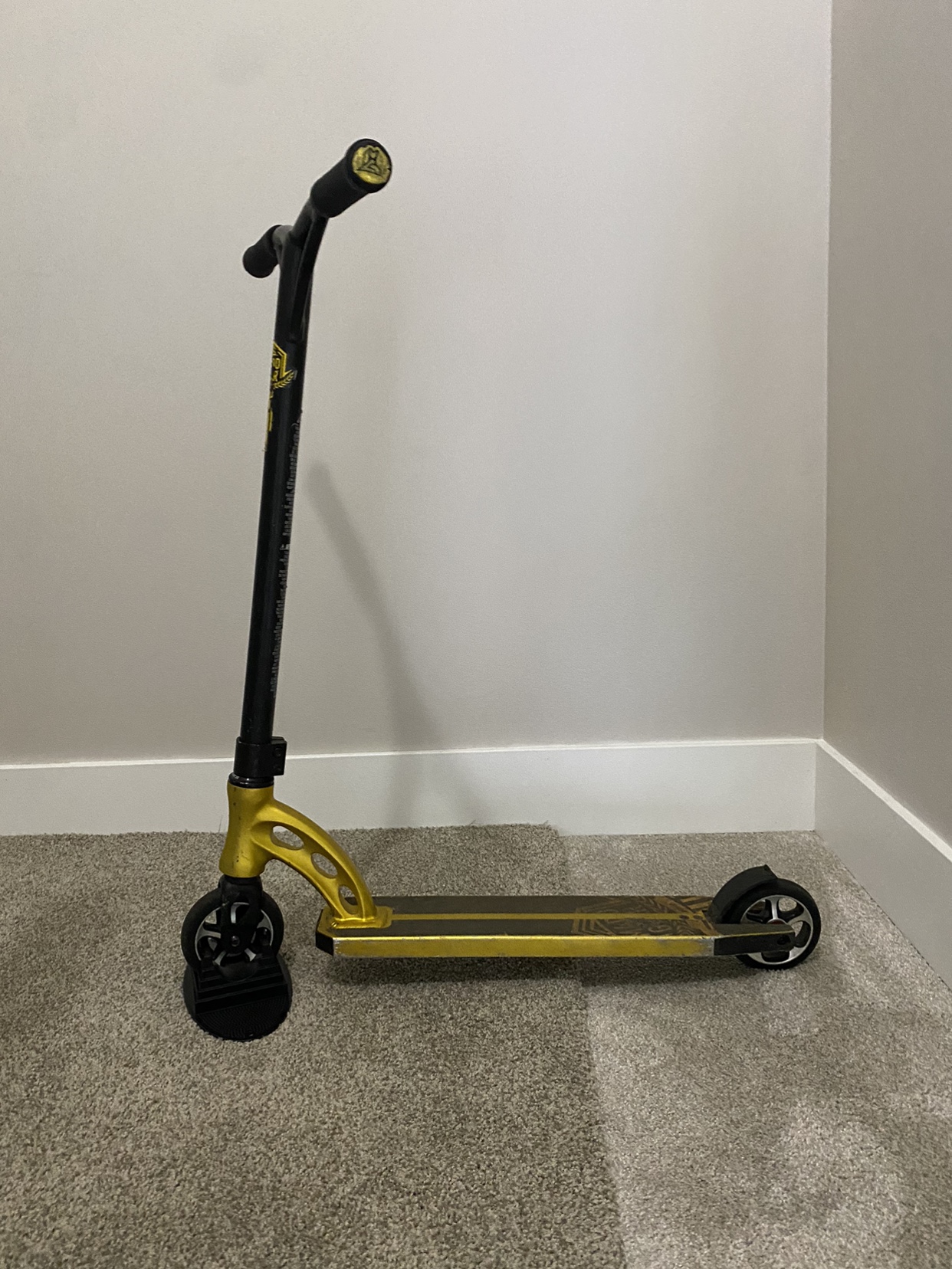 Black and Gold Stunt Scooter thumbnail