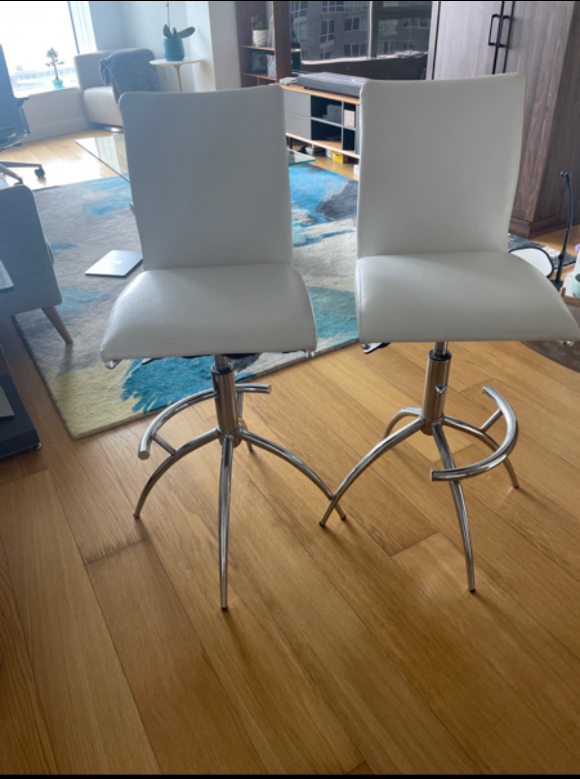 White faux leather bar stools