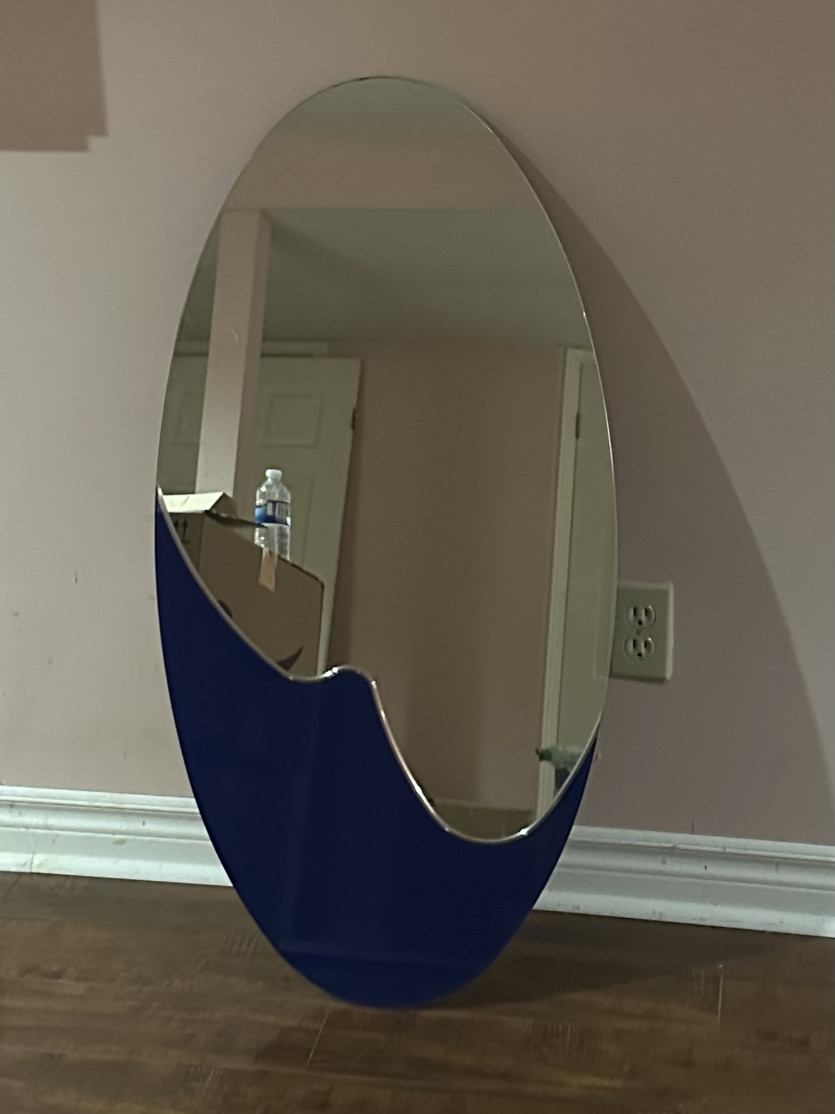 Oval Mirror with Blue Accent
