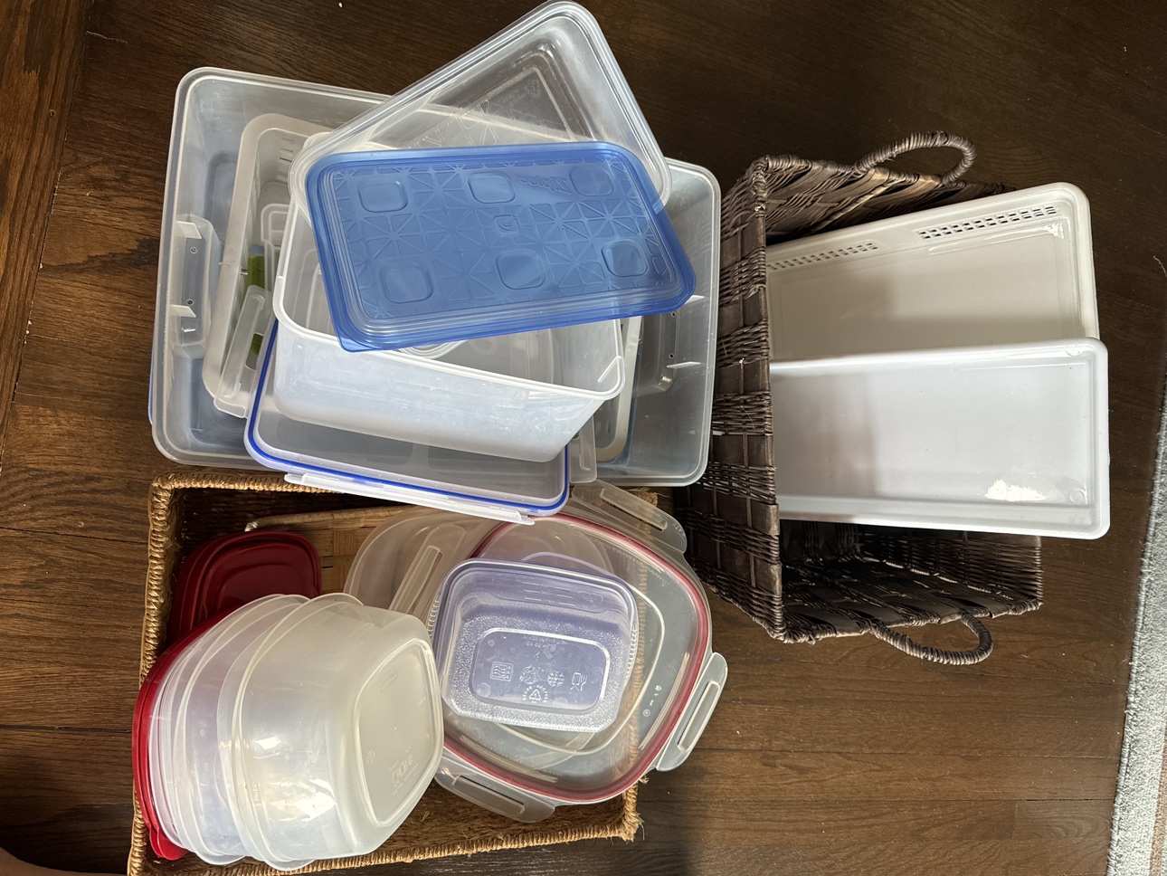 Assorted baskets, plastic containers. thumbnail