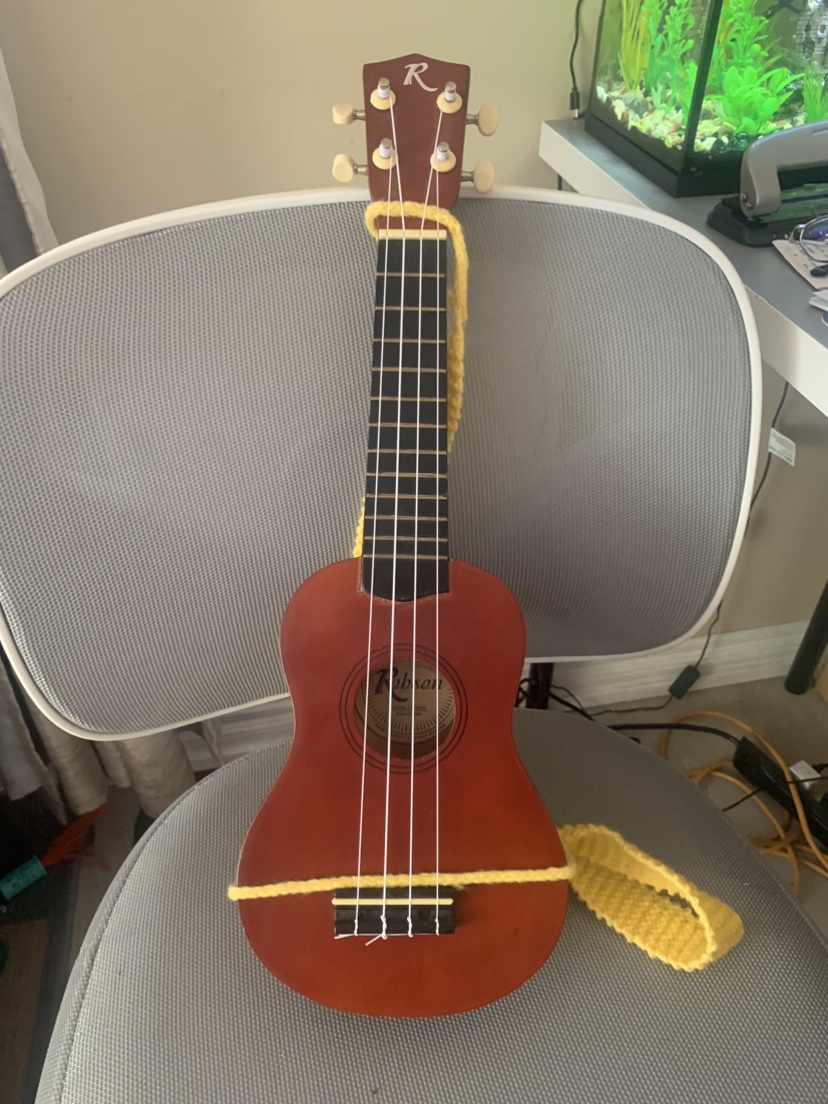 Ukulele with Yellow Strap thumbnail