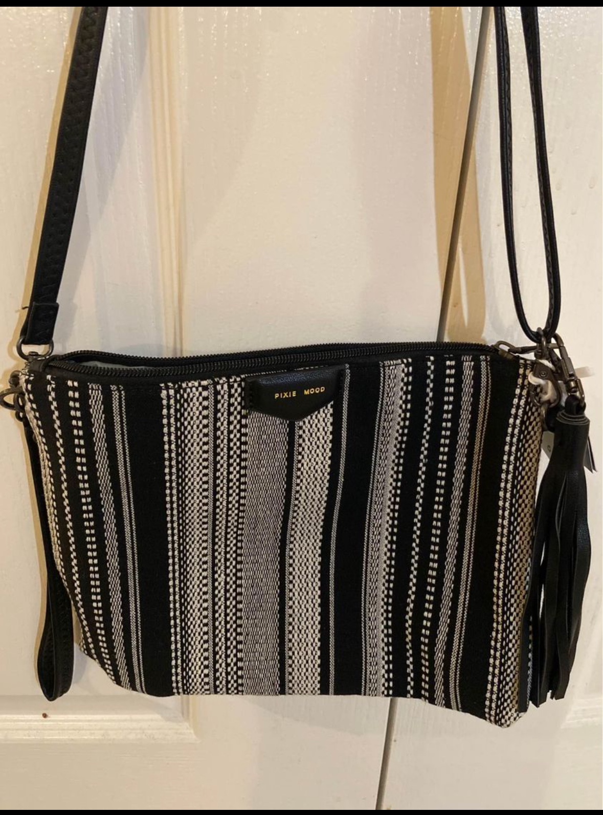 Brand new Pixie Mood Black and White Stripe Crossback/Clutch image indicator(2)