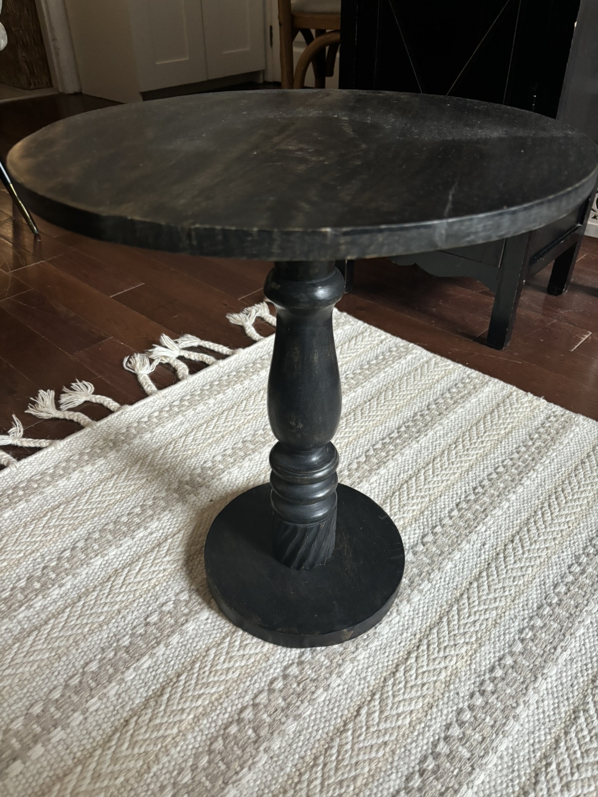 Round wooden side table