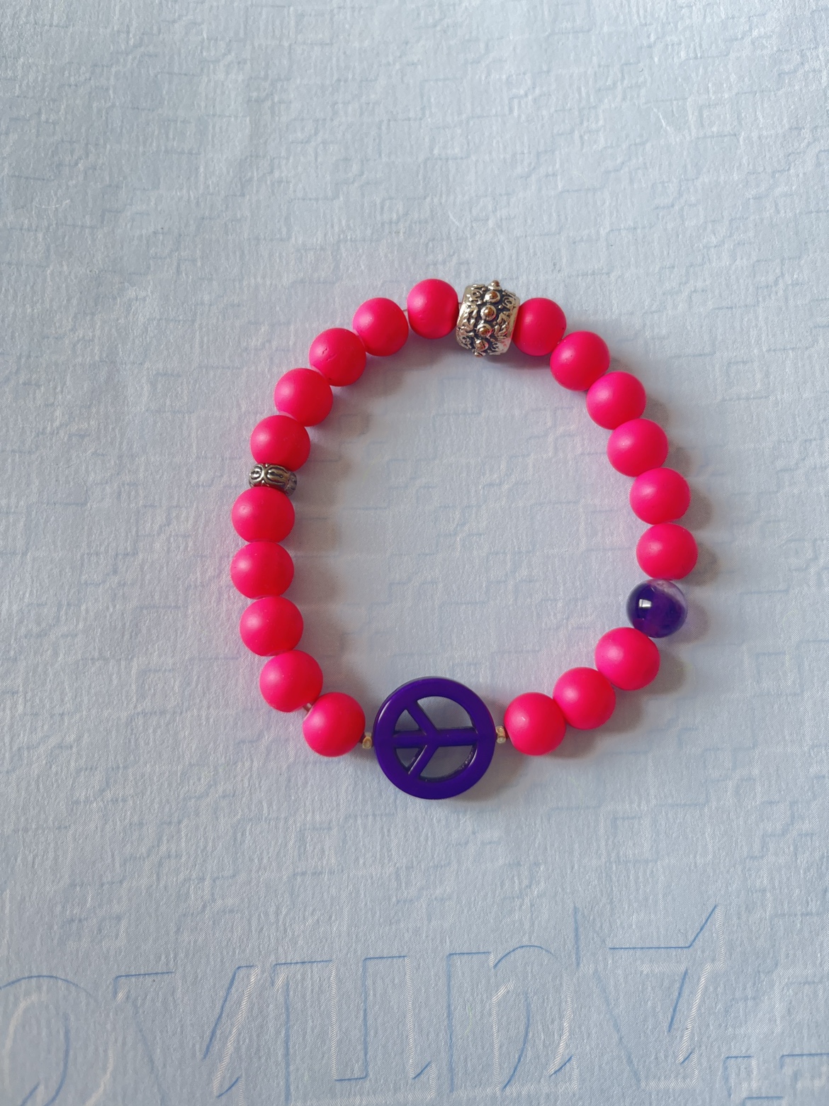 Pink beaded bracelet with peace sign charm #freecycle thumbnail