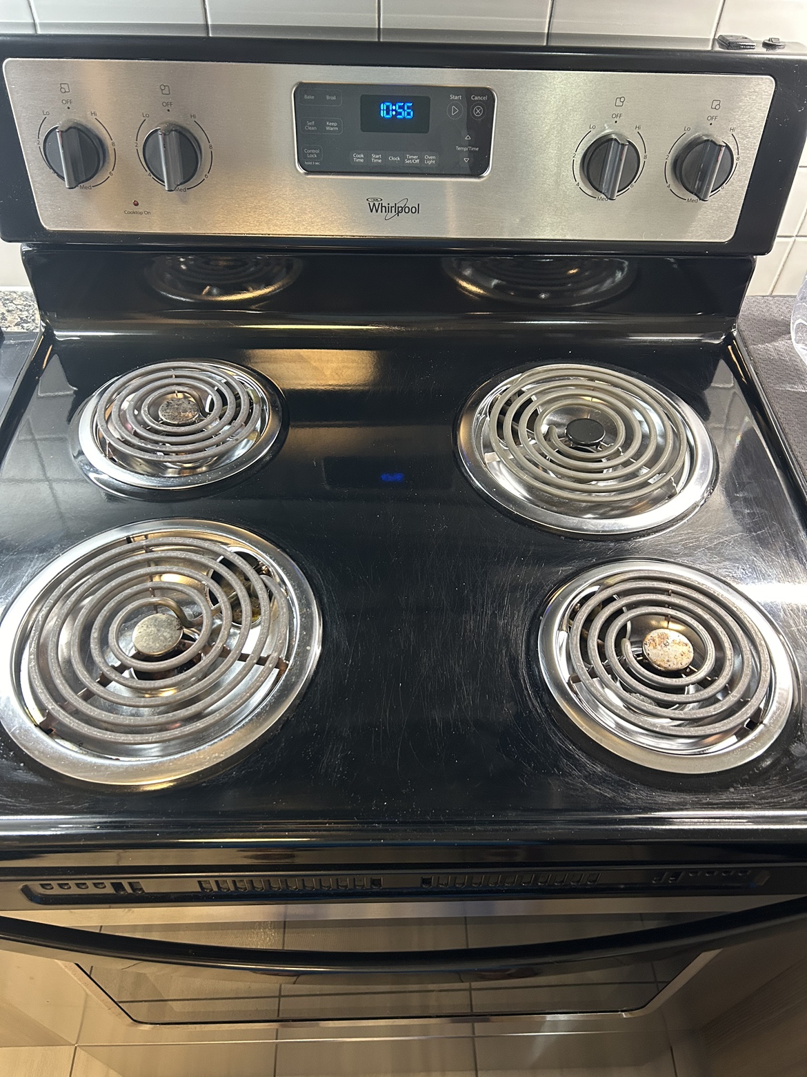 Whirlpool black and silver oven and stove - photo 2