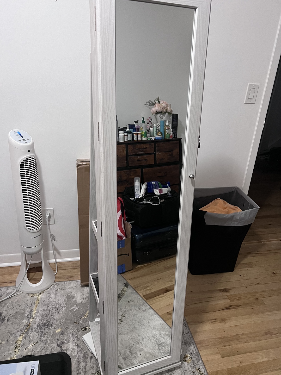 Full length storage mirror