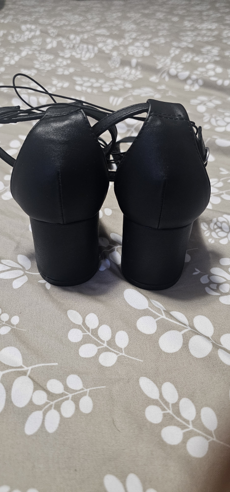 Black heels with ankle strap and buckle closure - photo 3