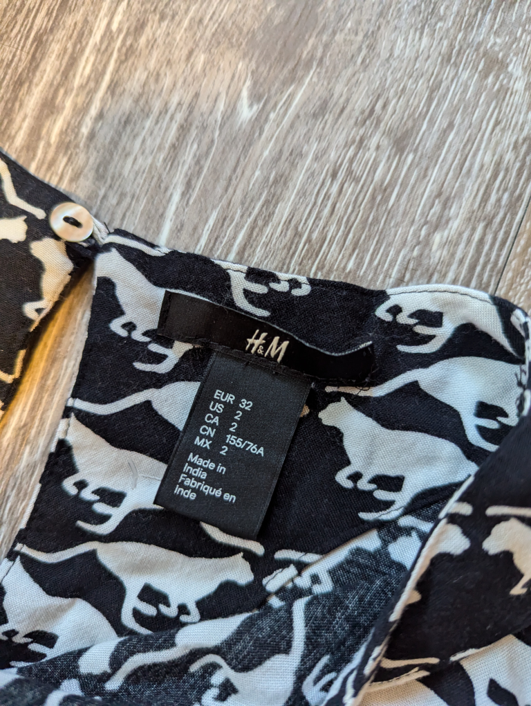 H&M Black and White Long Sleeve cat dress image indicator(2)