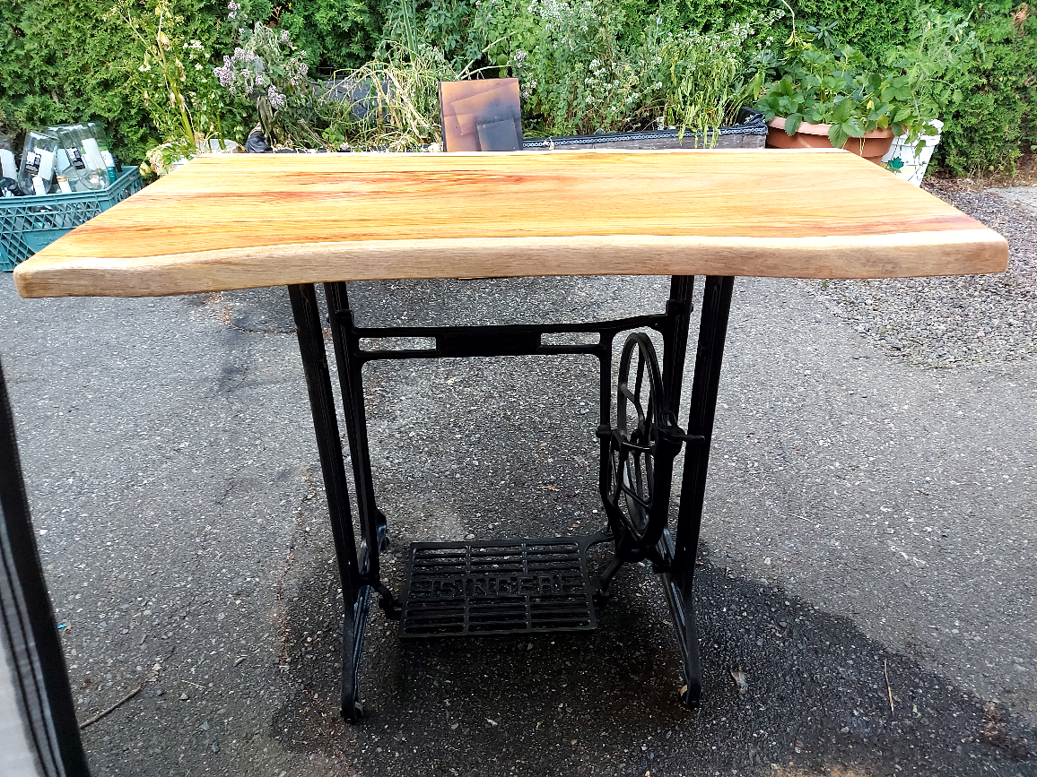 Live Edge Table on Vintage Sewing Machine Base.