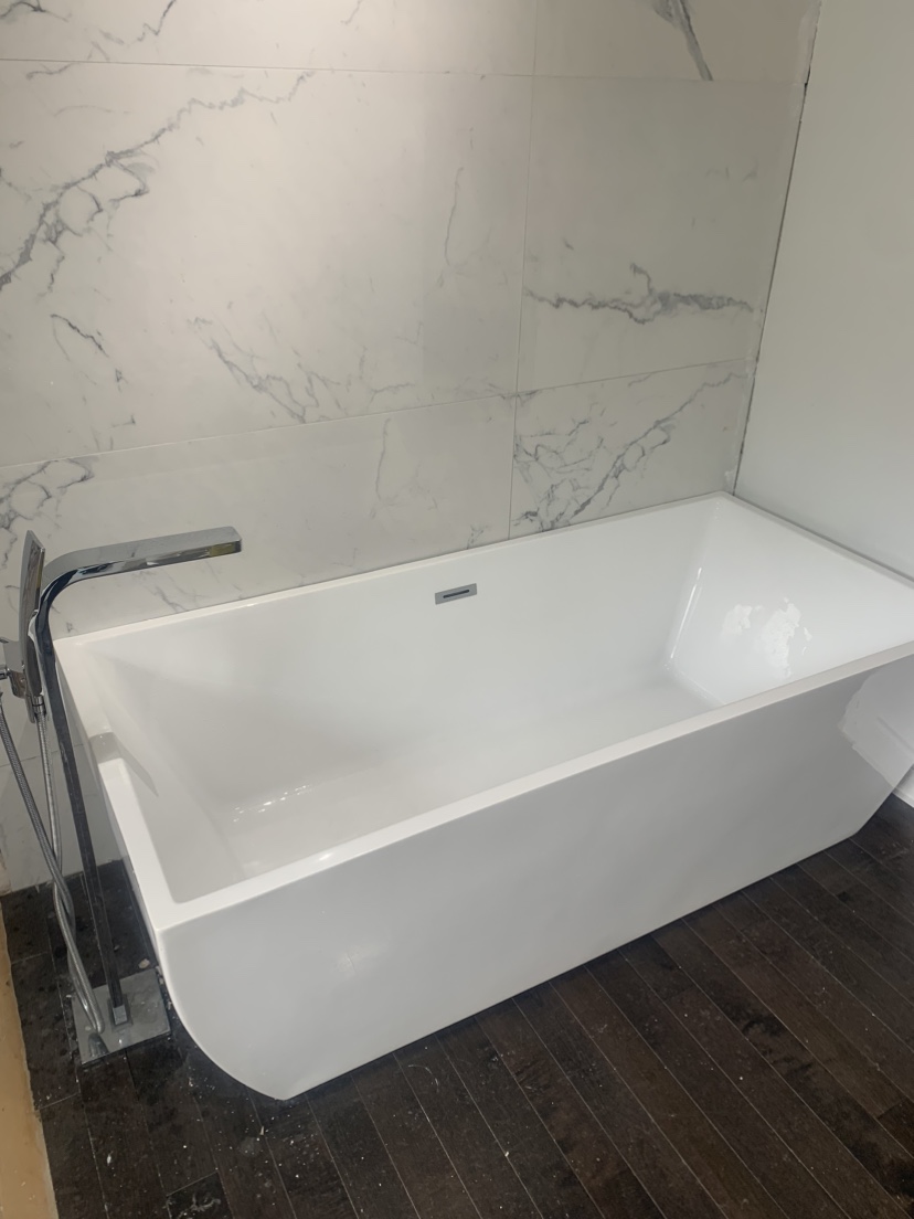 Free standing tub and faucet