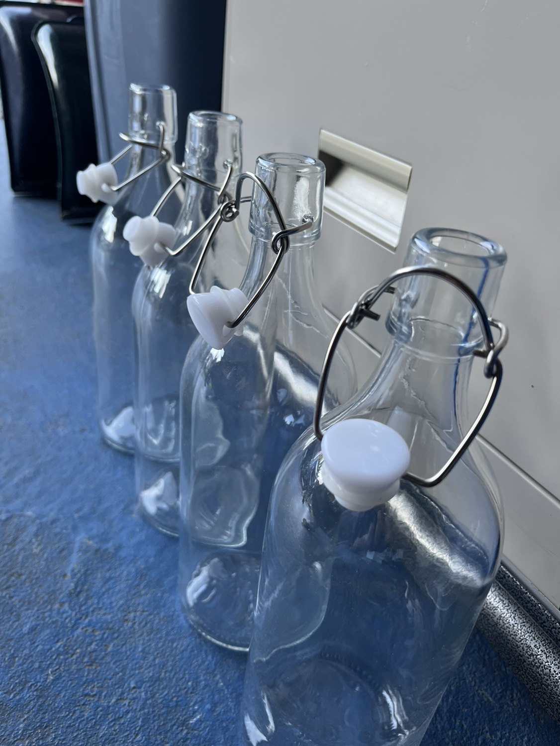 Set of 4 Glass Bottles with Swing Tops image indicator(5)