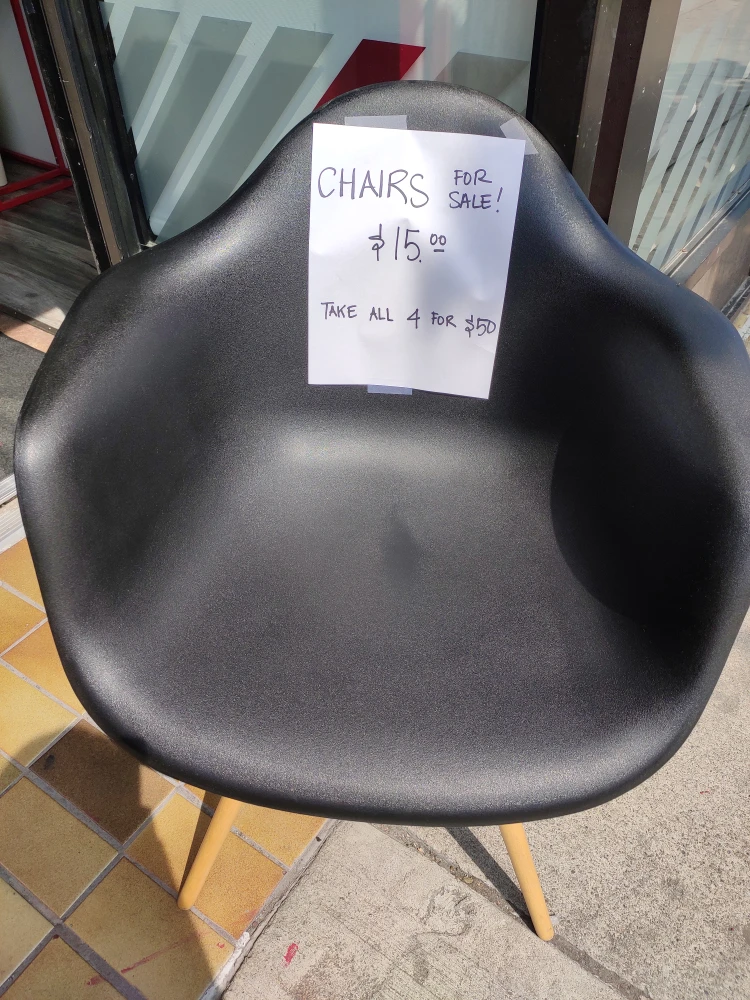 Black Plastic and Wood Chair