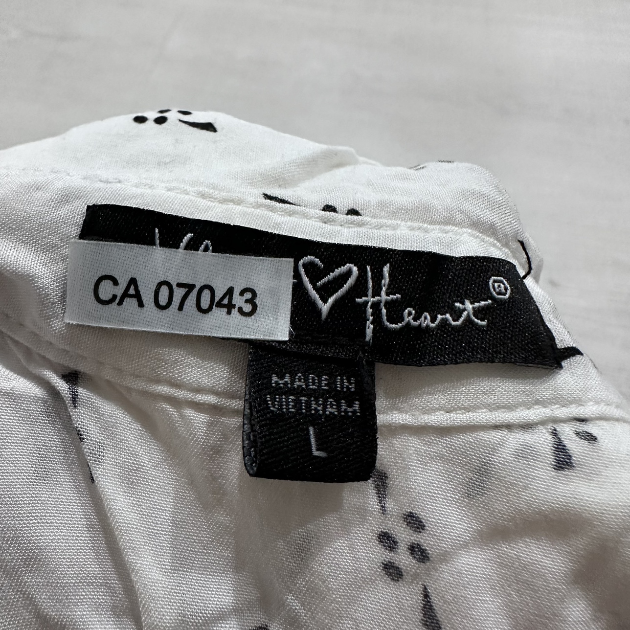 White Printed Sleeveless Blouse image indicator(3)