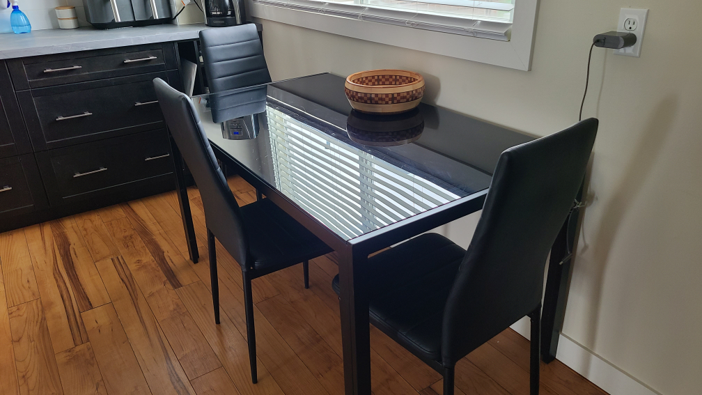 Black Glass Dining Table with Four Chairs