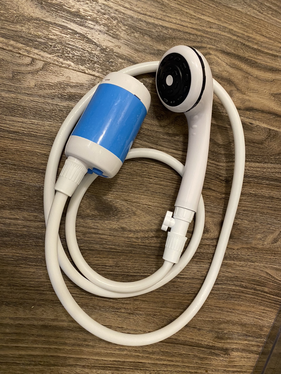 Portable rechargeable shower and water pump