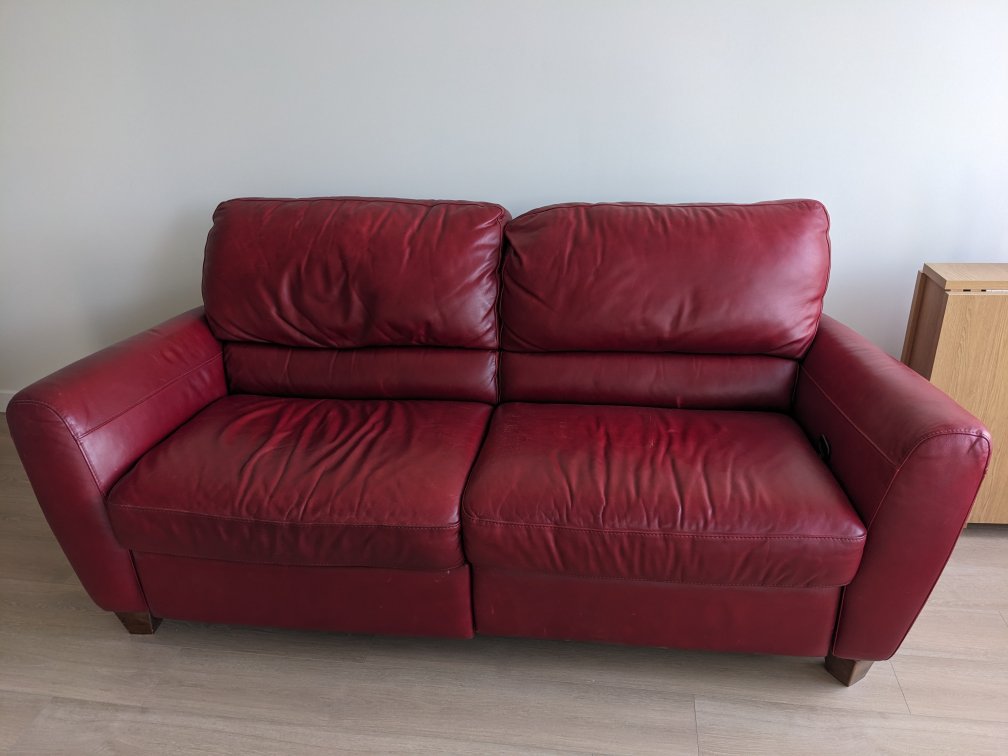 Red leather reclining couch