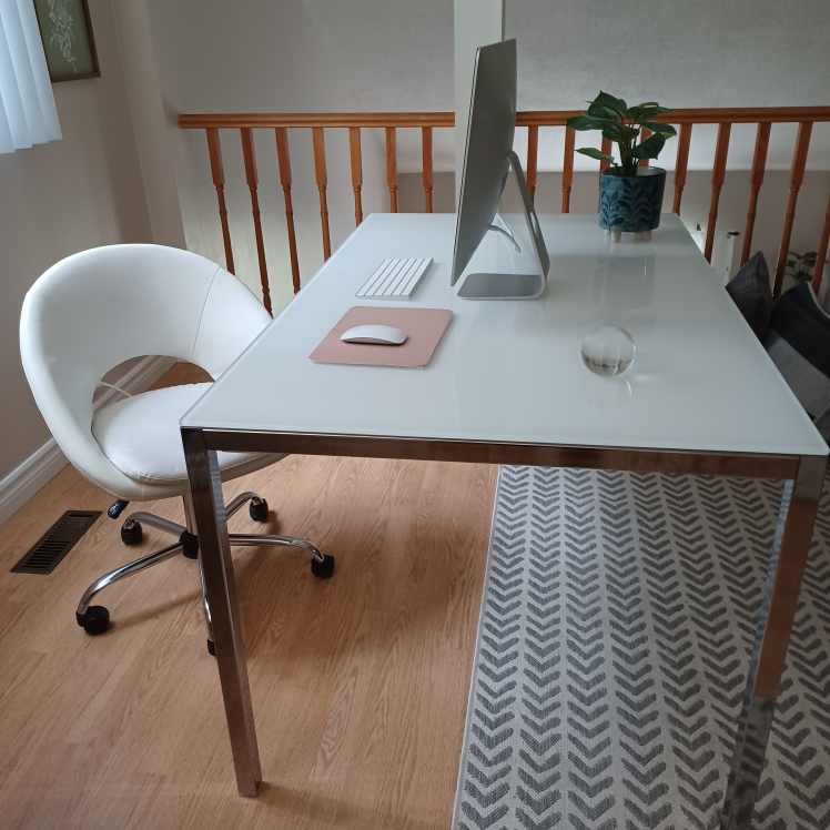 glass top table and chair
