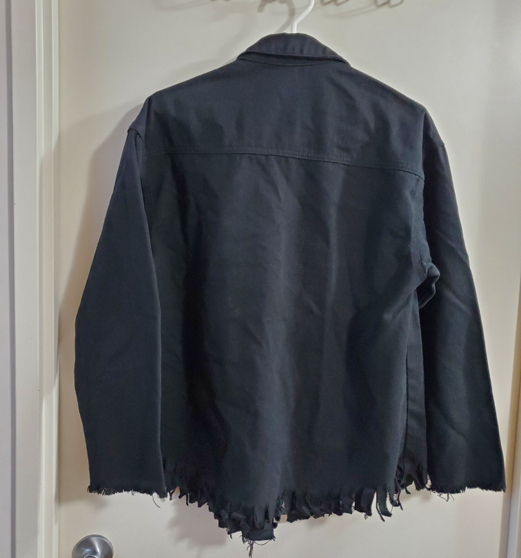 Black denim jacket with fringes image indicator(2)