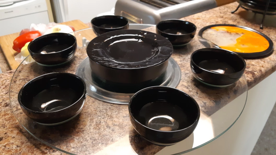 lazy Susan glass tray with black glossy condiment cups image indicator(2)