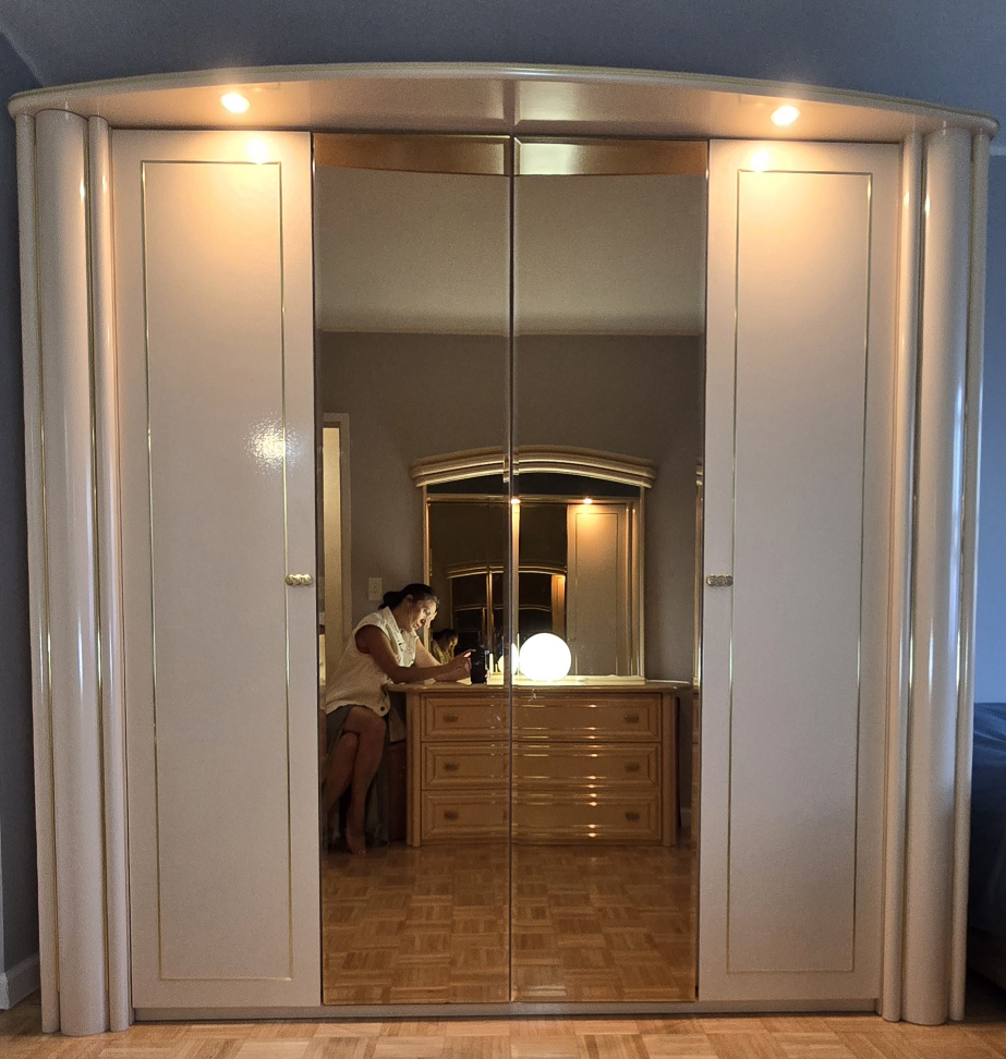 Mirrored Armoire with Gold Accents