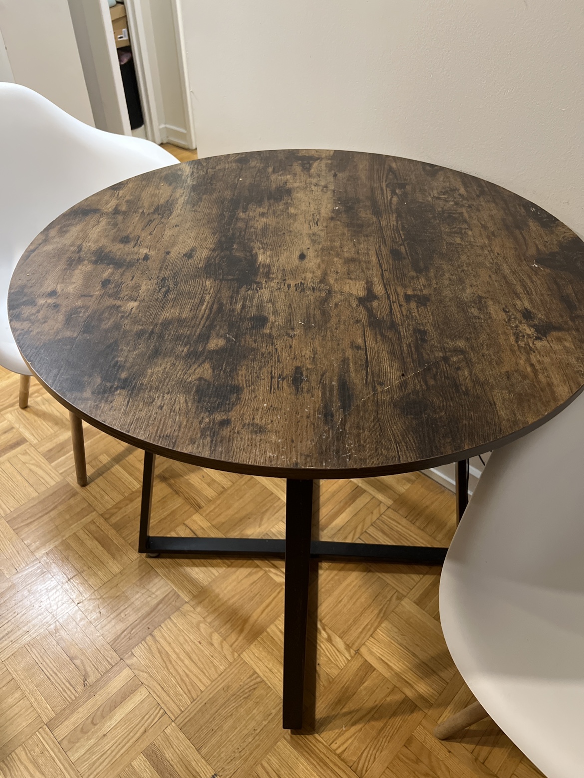 Round wooden rustic dinner Table with Black Base