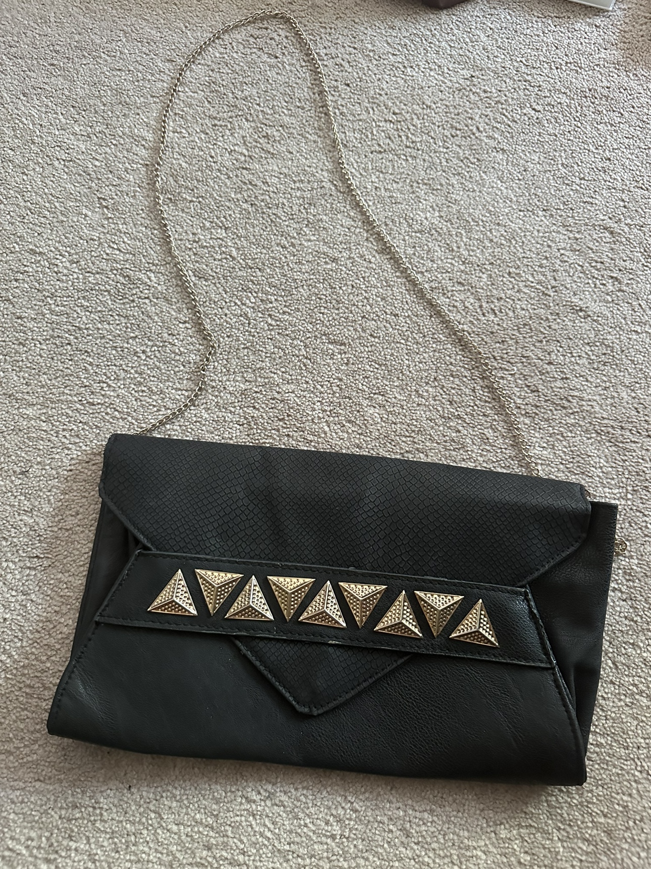 Look black & gold clutch