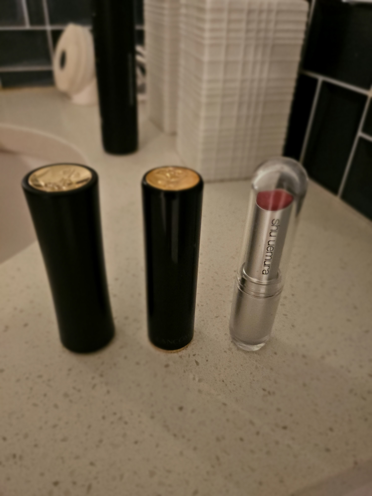 Lancome and Shu Uemura lipsticks and face palette