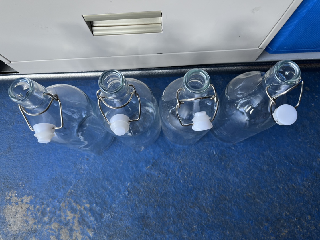 Set of 4 Glass Bottles with Swing Tops image indicator(7)