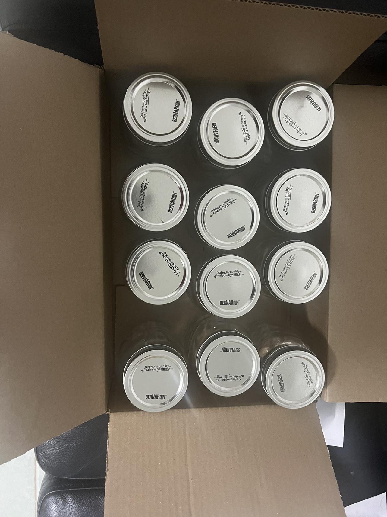 Set of 4 Glass Jars with Lids