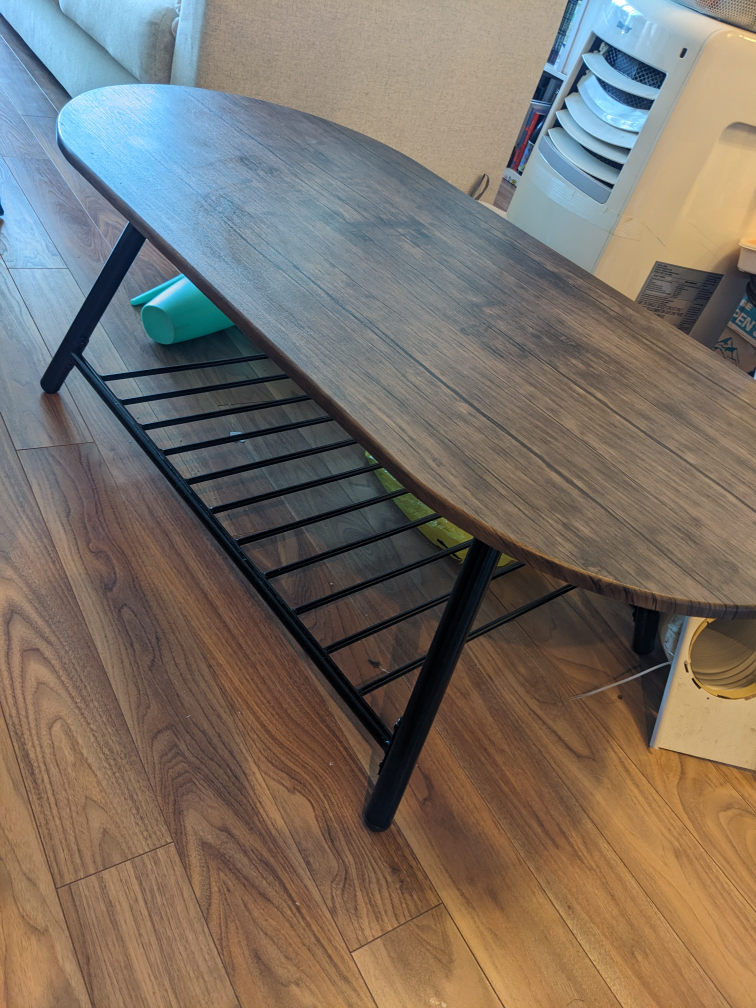 Coffee table with storage shelf