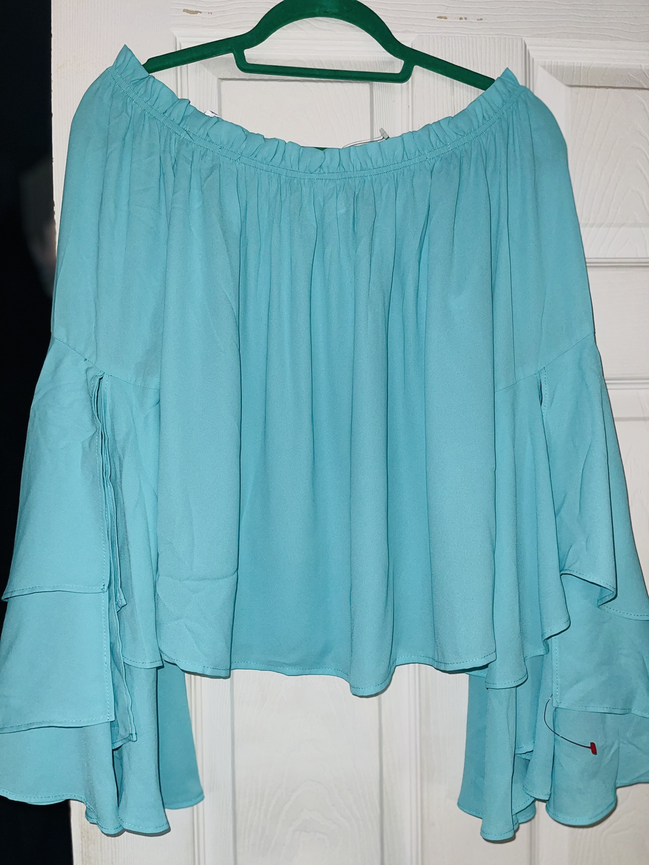 Off the shoulder blouse with cascading sleeves new image indicator(2)
